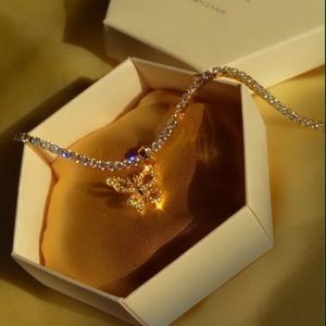 DBL BUTTERFLY TENNIS CHAIN CHOKER